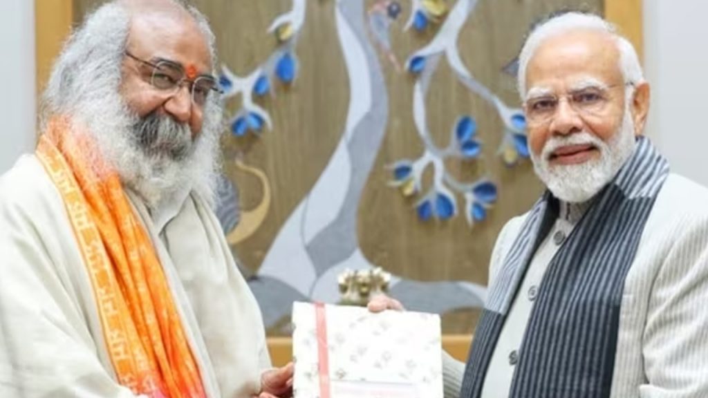 Acharya Pramod Krishnam with Prime Minister Narendra Modi.