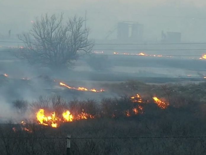 Rapidly expanding fires in texas