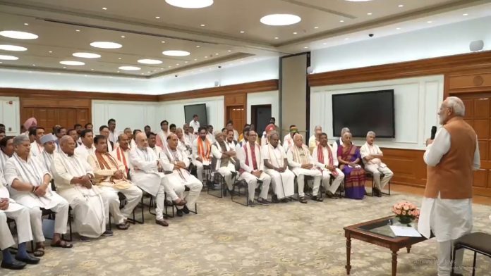 Modi meeting his cabinet ministers his house at Delhi