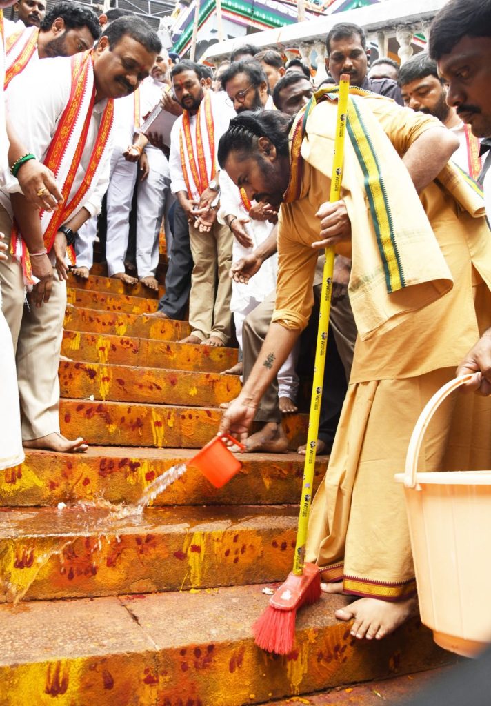 pawan cleans vijayawada temple